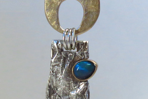 14K gold, black opal and sterling silver pendant.